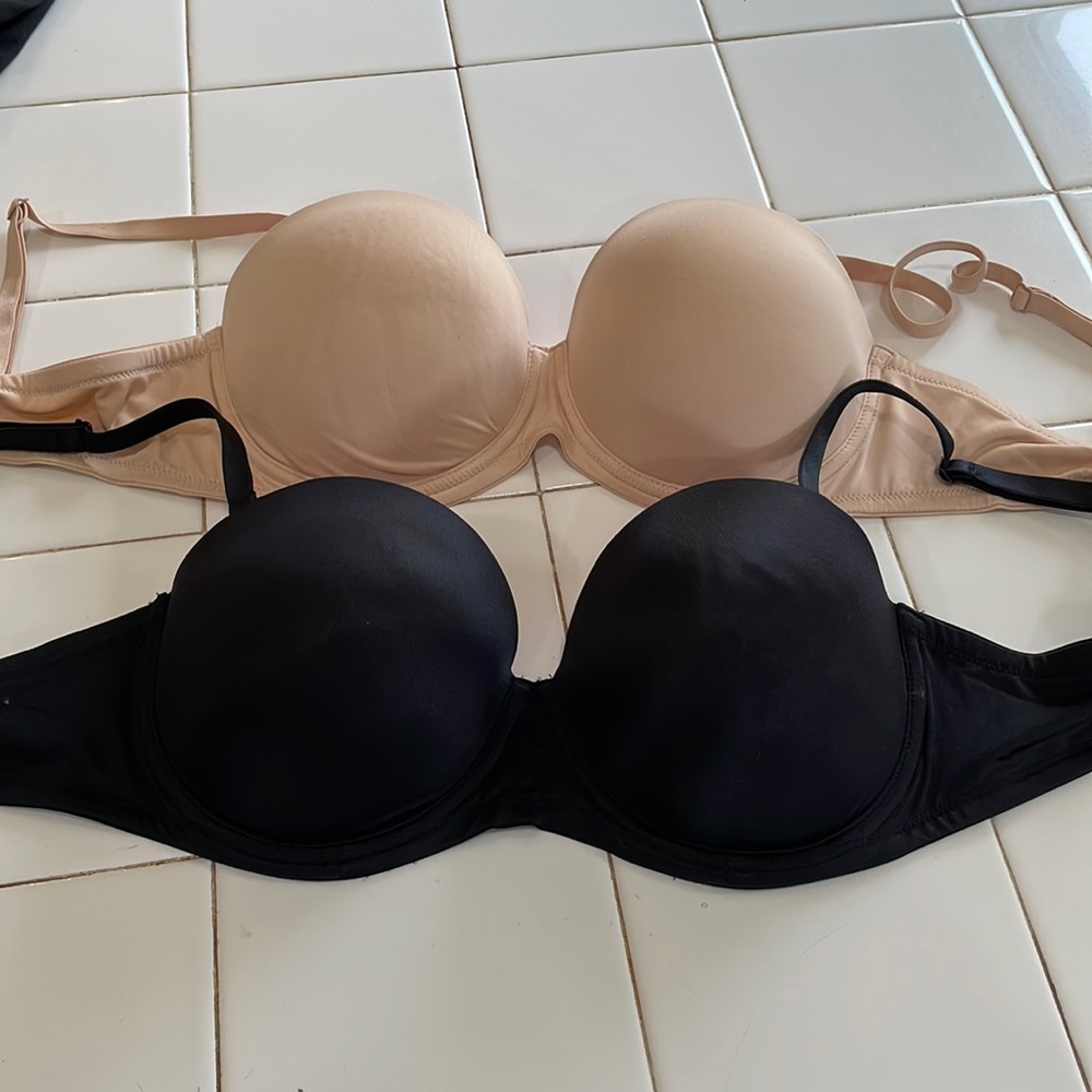 Two strapless Victoria Secret Bras